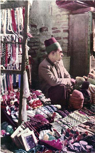 A market seller in Baghdad, printed size 11cm wide x 17.4cm high